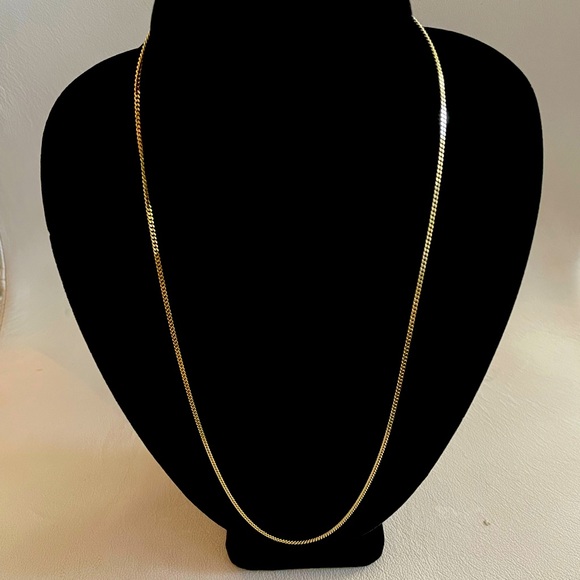 14 karat yellow gold 24 inch Cuban microlink chain. 2 mm wide weighing 8.2 g.